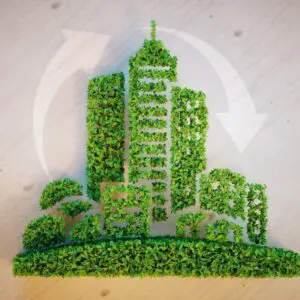 Cityscape Made Of Green Foliage On Wood, Symbolizing Eco-friendly Urban Development.