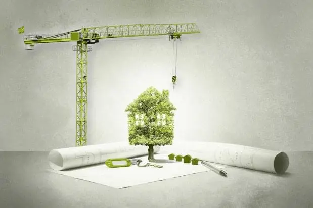 Crane builds a tree-shaped house over blueprints, symbolizing sustainable construction.