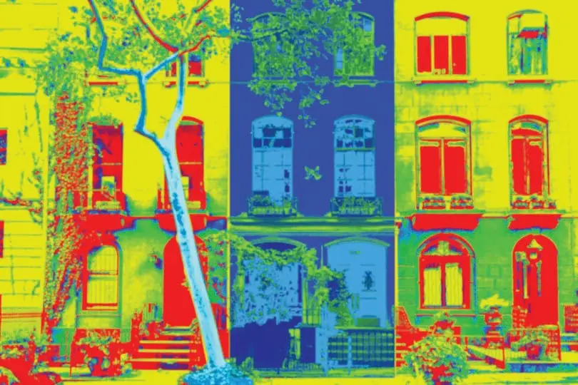 Thermal image of brownstone houses showing heat loss patterns across facades, windows and rooflines in contrasting colors.