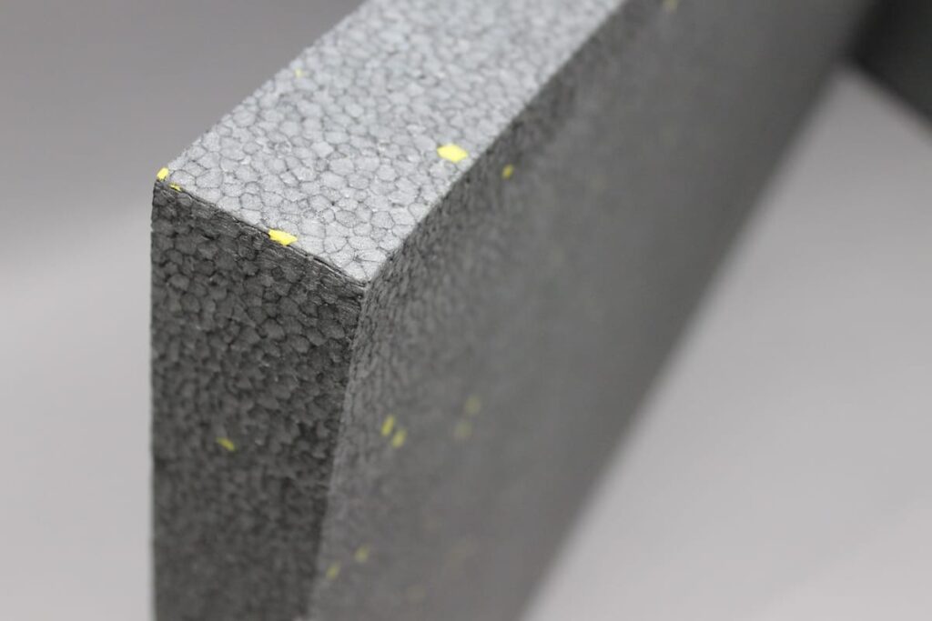 Close-up of Sto GPS insulation board showing textured surface and composite material makeup.